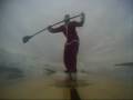 santa sup surfing