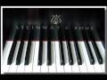 Lawrence Campbell playing the piano,...