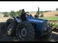 County 1454 Tractor with Disc Harrows