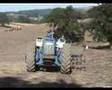 County 1454 Tractor with Disc Harrows