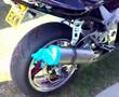 Rubber glove on Kawasaki ZX7 exhaust