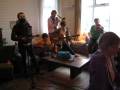 Parachutes play Tree Roots Turn To Forts in the lounge room