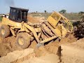 Carregadeira Caterpillar 924F e esteira Komatsu D-50 refazendo aterro ... Fazenda São Francisco Brianorte Mato Grosso MT 170 Nova Maringa Brasnorte 