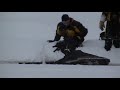 Snowmobile Accident Ski-doo trys to skip water and sinks