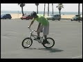 BMX Bike Tricks & Safety : How to Pick up the Back Wheel on a BMX Bike