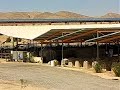 Milking the Sun. Photovoltaic Solar panels on a Milk-Farm roof Negev desert Israel Milking the Sun. Photovoltaic Solar panels on a Milk-Farm roof Negev desert Israel
