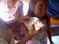 Kids posing with their fish