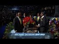 A gospel choir sings ” Soon and Very Soon ” at the memorial service for Michael Jackson