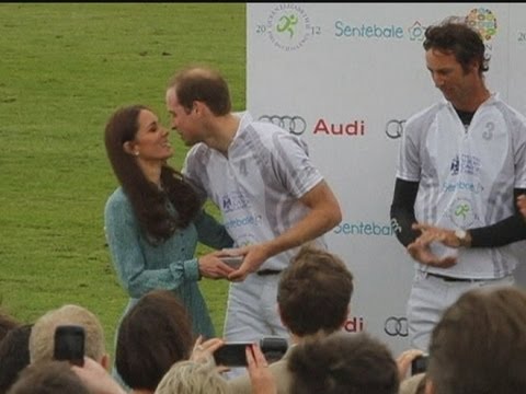 Kiss me Kate! William and Harry get a peck on the cheek from the Duchess of Cambridge Video