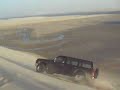 sand dunes and 4x4s