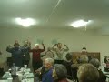 Hundred tear old woman does chicken dance