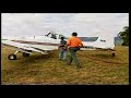 ag wagon,fire bombing,tasmania,ag wagon landing on steep strip.ag plane