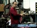 How to Fix a Lawnmower : Cleaning the Carburetor of a Lawn Mower