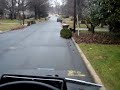 Dumping cans in a garbage truck