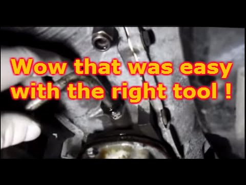 How to remove the transmission line on a Cadillac