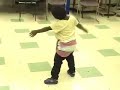 Small Child Practices West African Dance Moves