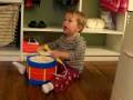 Aidan singing and drumming Aidan singing and drumming