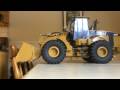 Wedico Cat 966 GII Testing the new bucket teeth - free flv video @ vwatch.tv
