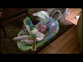 baby in her bouncer