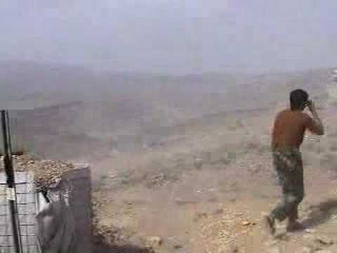 Guy misfires a rocket launcher