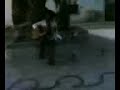 playing guitar and sing in a road in portugal and bahia is dancing very drunk and funny.here are the words of the song
quero voltar pra bahia
paulo diniz

composi��o: paulo diniz/odibar

i don't want to stay here
i wanna to go back to bahia

eu tenho andado t�o s�
quem me olha nem me v�
sil�ncio em meu viol�o
nem eu mesmo sei porque.
de repente ficou frio
eu n�o vim aqui para ser feliz
cad� o meu sol dourado?
cad� as coisas do meu pa�s?

i don't want to stay here
i wanna to go back to bahia.

eu tenho andado t�o s�
quem me olha nem me v�
sil�ncio em meu viol�o
nem eu mesmo sei porque.
via intelsat eu mando
not�cias minhas para 