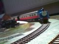 Thomas the tank engine pulling 2 coaches