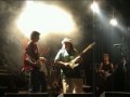 tino gonzales, sjors nederlof, arie verhaar live at klompop 29-05-2003. presentation of the cd nuke the world, where sjors nederlof, a young dutch brilliant guitarist, burns the whole house down on the damn first song.