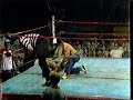 heels always like to make the fan favorites feel pain and the masked man won't even let tommy get up