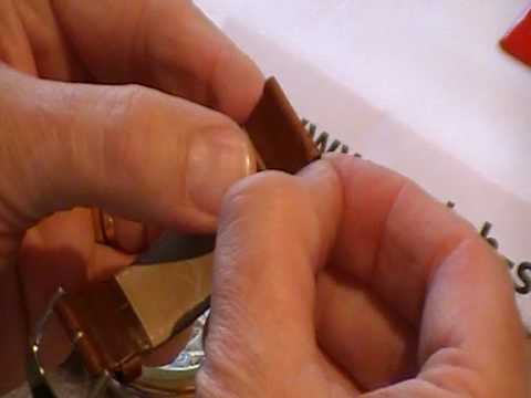 how to adjust ck watch strap