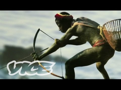 Safari - Tourists on India's Andaman Islands are taken by the busload to watch the Jarawa tribe go about their daily lives. The Jarawa are treated like animals in a s...