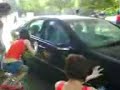 Singtel F1 grid girls wash car charity Singtel F1 grid girls wash car charity