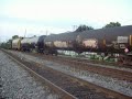 CSX 148 leads SB manifest with some wacky graffiti