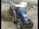 Farmtrac 675DT z paszowozem.wmv Farmtrac 675DT z paszowozem.wmv