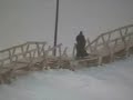 this video was taken of the frozen dvina river in  arkhangelsk, russia.  the people are walking across the frozen river to get to their homes on the other side.  several times a day, ice breakers would come through and break open a path for ships.  within minutes, the pedestrian commuters crossed again.  we walked to the point of the ice breakers one evening, but did not cross to the other side.  that night, we saw the northern lights.
