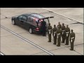The bodies of three UK soldiers have arrived back in Britain