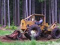 Jack skids the stump piles together