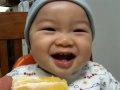 Branden eating an orange