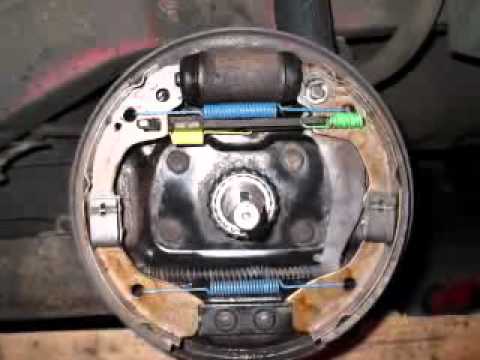 01 to 02 KIA Rio rear drum brake spring and pad placement