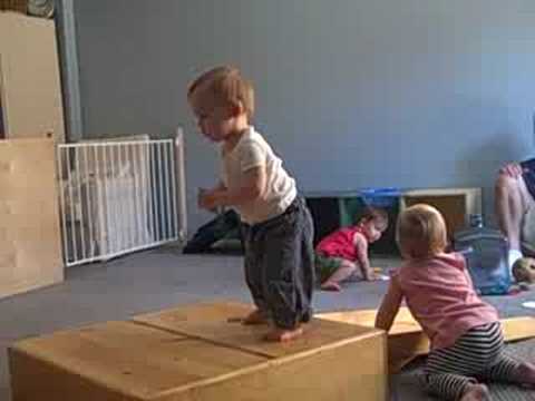 Rie - Infants at RIE playing, climbing, with adults selectively intervening.
