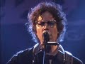the jayhawks on stage playing 