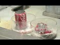 Coke Cans in Acid and Base - Periodic Table of Videos