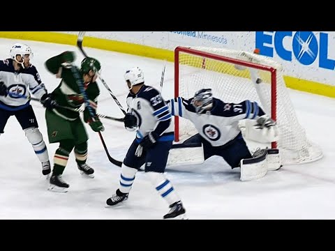 Video: Granlund perfectly tips puck by Hellebuyck to give Wild early lead