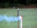Home made bottle rocket with fire cracker