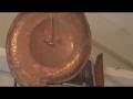 Doc Copper writes songs and sings them -- and builds handmade copper guitars