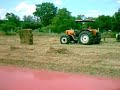 tractor Renault  Pal�s  baling with  Claas