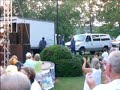 the band takes the stage, and eases in to  