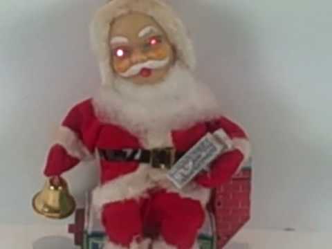 antique Toys 1950's - Santa Claus vintage toy made in Japan 1950's by HTC Co. Sitting on house, rings bell, eyes light up, original box. Available at www.CONNECTIBLES.net .