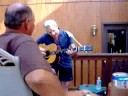 Pepe singing and playing bluegress