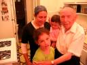 Shoshana Reciting Chumash to Zaidy Aryeh
