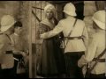 2010-05-09 | CESAR ROMERO Khoda Kahn's necklace ~> , Khoda Kahn (Cesar Romero) is being taken to jail...Winkie (Shirley Temple) runs to him to return the necklace he lost when he was captured. ... ()